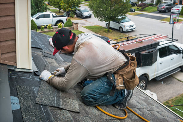 Professional Storm Damage Roof Repair technician working in Reading, PA